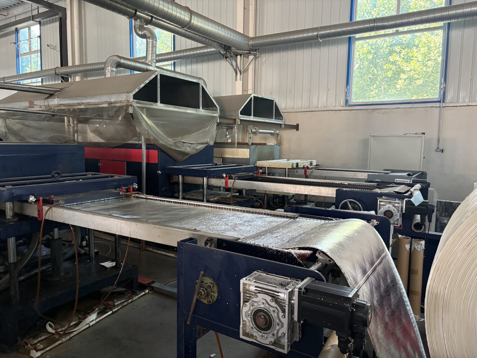 Wall panel production machine